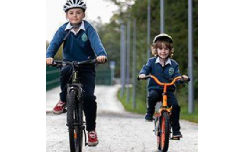 Two children cycling