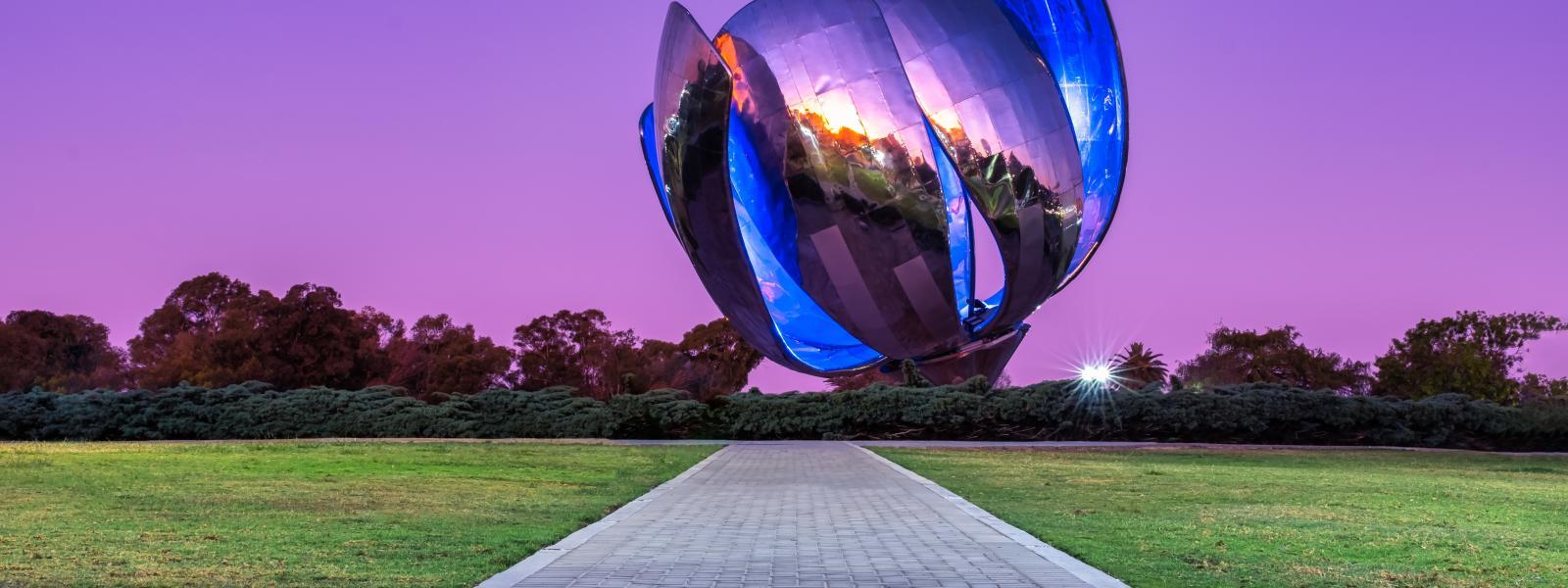 Metal flower sculpture at sunset, Beunos Aires