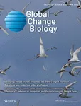 global change biology cover - birds flying in blue skies