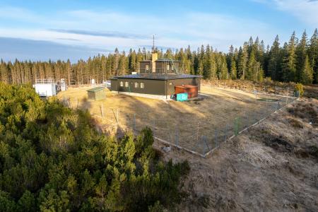 Environmental monitoring centre surrounded by pine forest