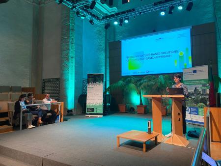 invest for nature conference - person presenting on stage