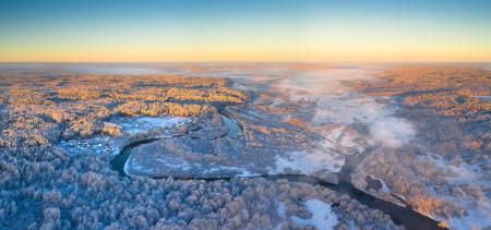 Aerial view of a snowy forest in Finland