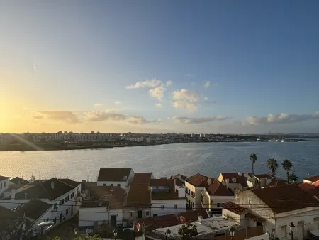 Sunset above a city by the water