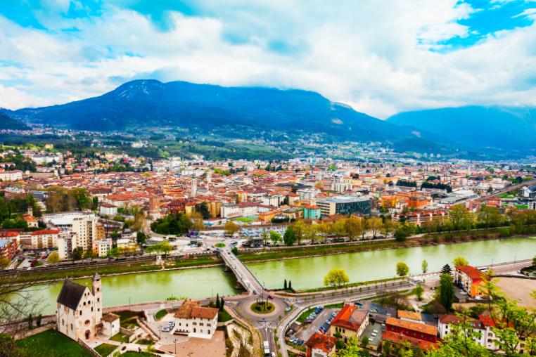 View of Trento, Italy with river in the foreground