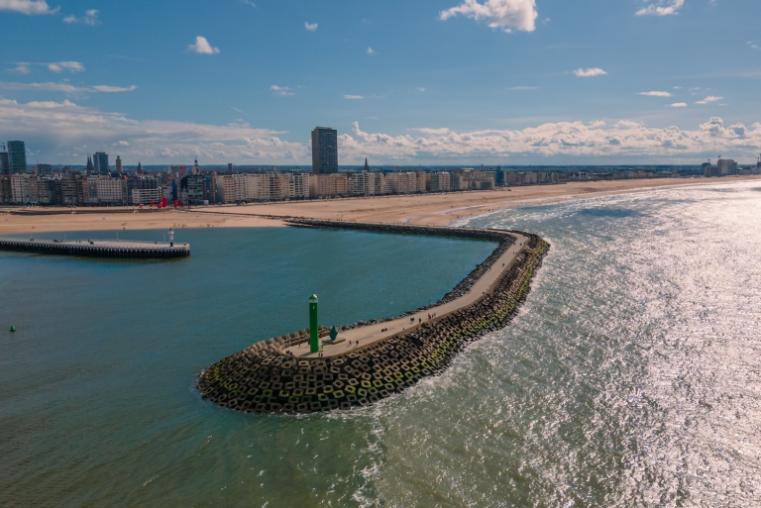 An aerial view of the Strand of Ostend, Belgium with beach and buildings in the background