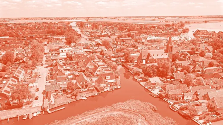 Aerial view of a city with a river